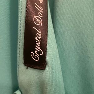 Is crystal doll dress  size 5  lime green is Cleaning  is fit  shapes back zip